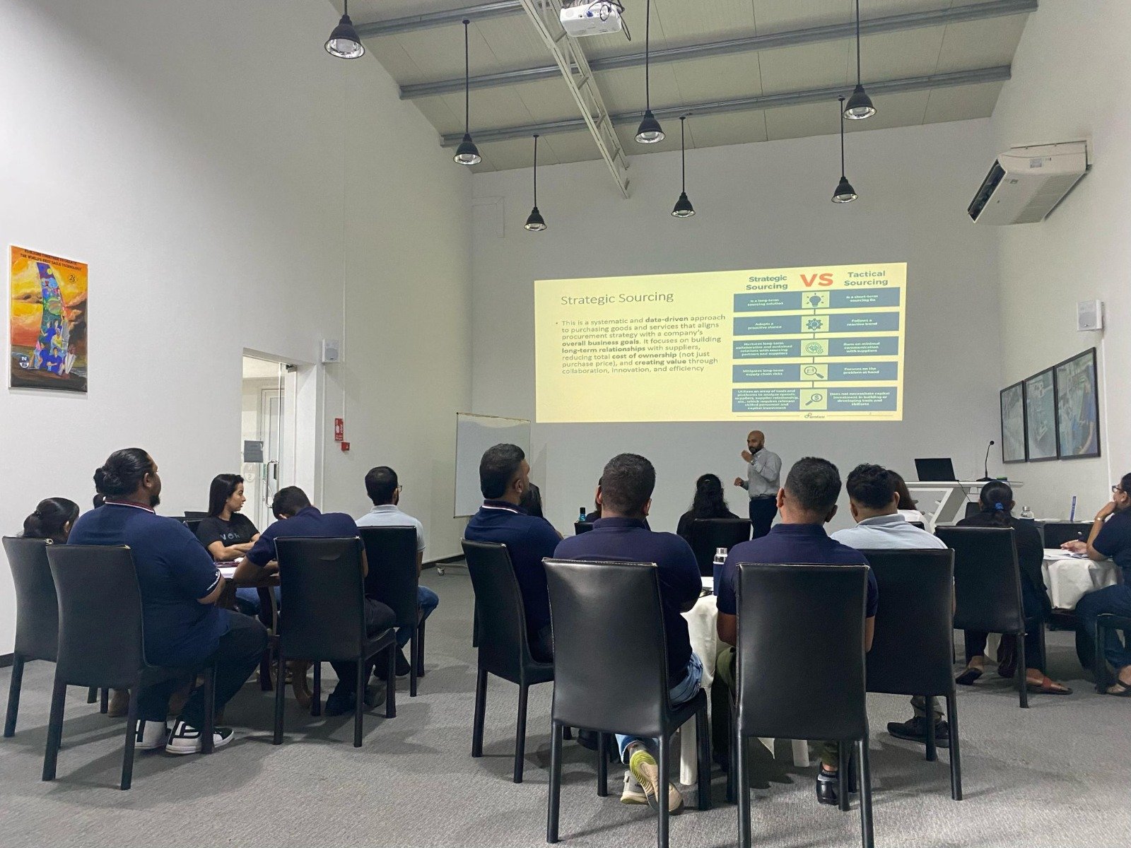 Salman Faiz delivering a strategic sourcing training presentation at a corporate venue in Colombo